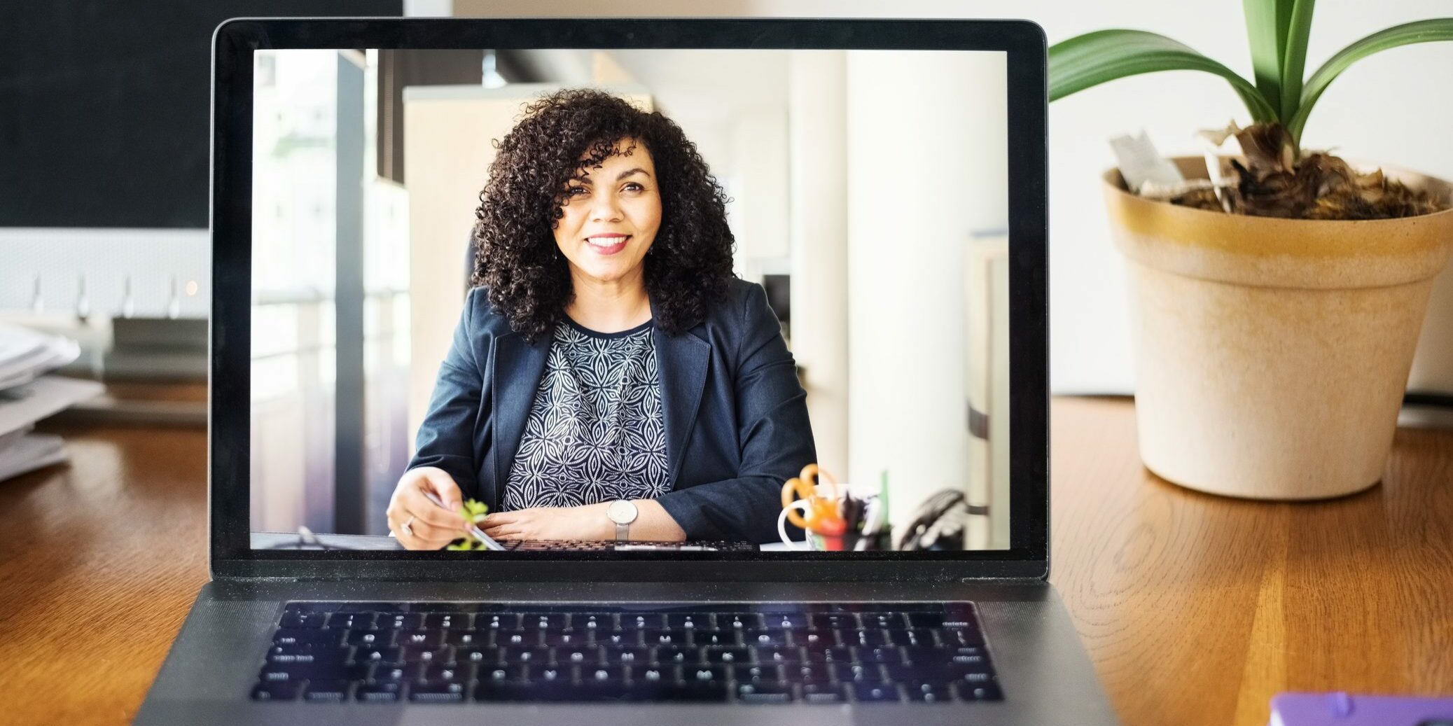 Shot of a mid adult businesswoman having a video call on a laptop