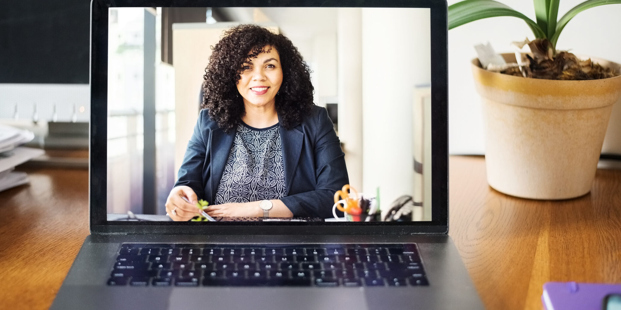 Shot of a mid adult businesswoman having a video call on a laptop