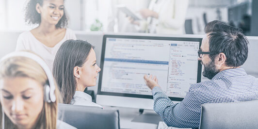 Developing programming and coding technologies. Website design. Programmer working in a software develop company office.